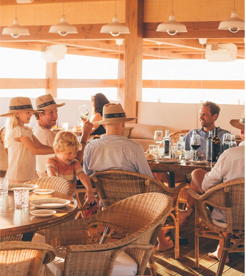Long lunch with friends and children at a beach restaurant near Marbella